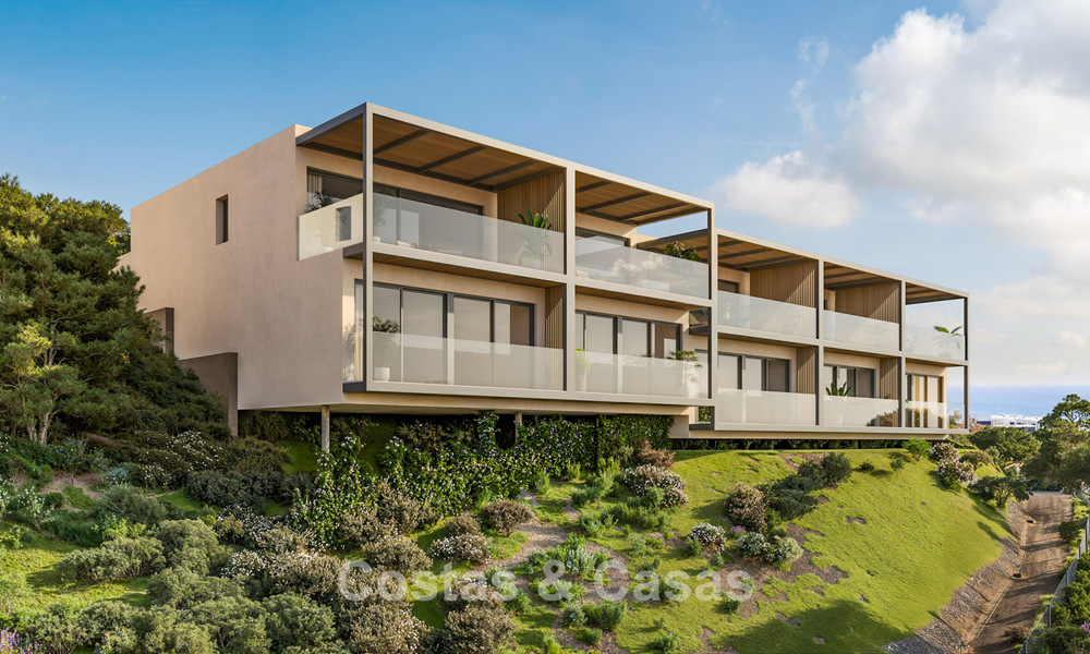 Villas adosadas innovadoras con vistas al mar en venta en una exclusiva zona residencial de Fuengirola, Costa del Sol 802627