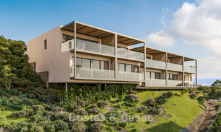 Villas adosadas innovadoras con vistas al mar en venta en una exclusiva zona residencial de Fuengirola, Costa del Sol 802627 