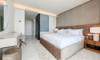 Moderno apartamento en planta baja con jardín y vistas al mar en venta en un exclusivo complejo boutique cerca de Marbella 802605 