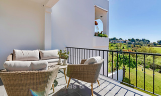 Casa adosada renovada con vistas frontales al campo de golf en venta en Aloha, Nueva Andalucía, Marbella 803150 