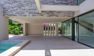 Nueva, exclusiva villa moderna lista para entrar a vivir en venta en una zona de playa cerca de San Pedro, Marbella 803580 