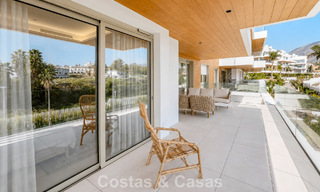 Exclusivo apartamento moderno de 3 dormitorios listo para entrar a vivir en venta en la Milla de Oro de Marbella 803813 