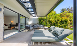 Casa de estilo andaluz modero en venta en una urbanización cerrada en primera línea de Aloha Golf, Nueva Andalucía, Marbella 803759 