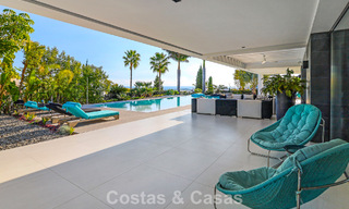 Exclusiva villa con vistas panorámicas al mar en venta en Los Flamingos, resort de golf de 5 estrellas en Marbella - Benahavís 804755 