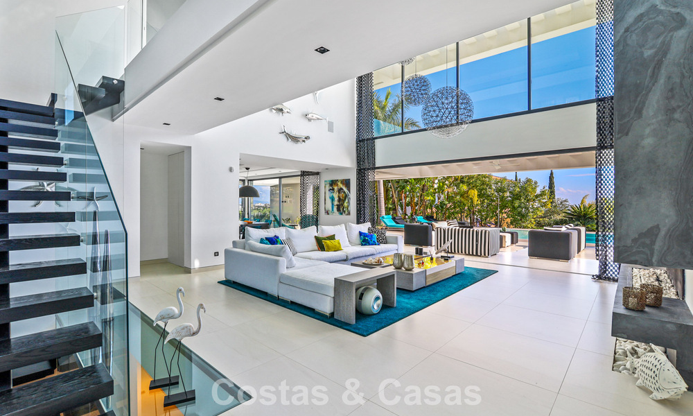 Exclusiva villa con vistas panorámicas al mar en venta en Los Flamingos, resort de golf de 5 estrellas en Marbella - Benahavís 804764