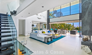 Exclusiva villa con vistas panorámicas al mar en venta en Los Flamingos, resort de golf de 5 estrellas en Marbella - Benahavís 804764 