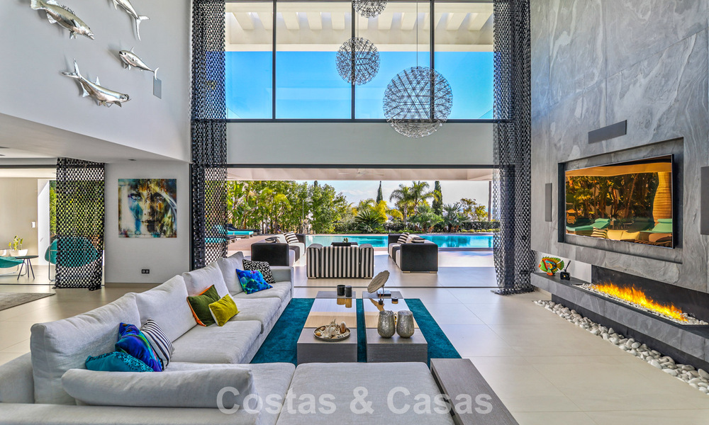 Exclusiva villa con vistas panorámicas al mar en venta en Los Flamingos, resort de golf de 5 estrellas en Marbella - Benahavís 804765