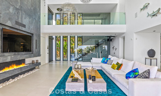 Exclusiva villa con vistas panorámicas al mar en venta en Los Flamingos, resort de golf de 5 estrellas en Marbella - Benahavís 804773 