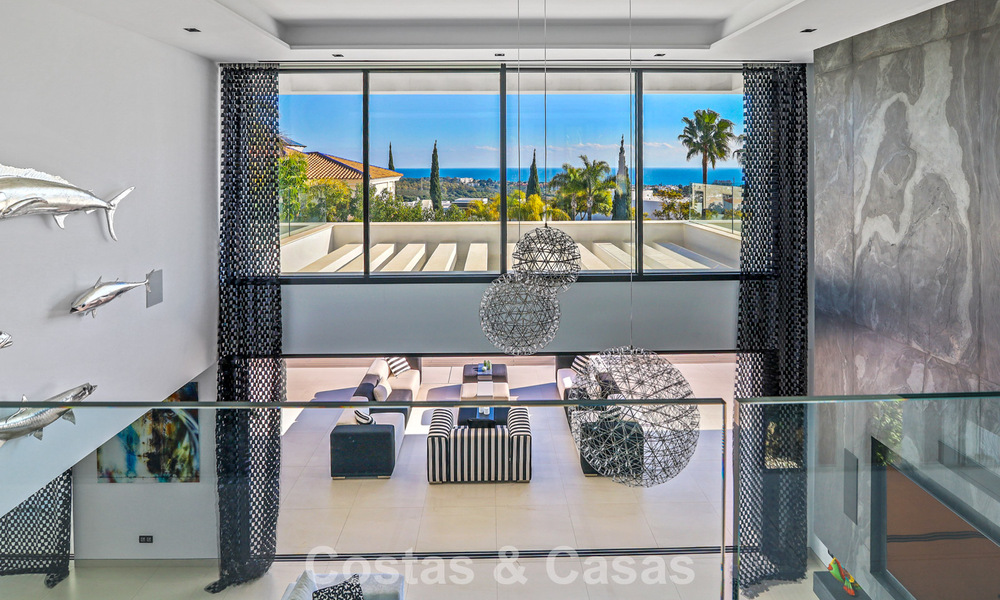 Exclusiva villa con vistas panorámicas al mar en venta en Los Flamingos, resort de golf de 5 estrellas en Marbella - Benahavís 804777