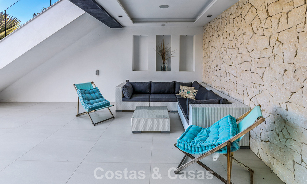Exclusiva villa con vistas panorámicas al mar en venta en Los Flamingos, resort de golf de 5 estrellas en Marbella - Benahavís 804794