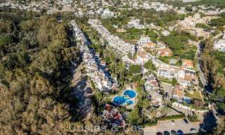 Apartamentos en venta en un complejo residencial en primera línea de playa en Elviria, Marbella Este 805126 