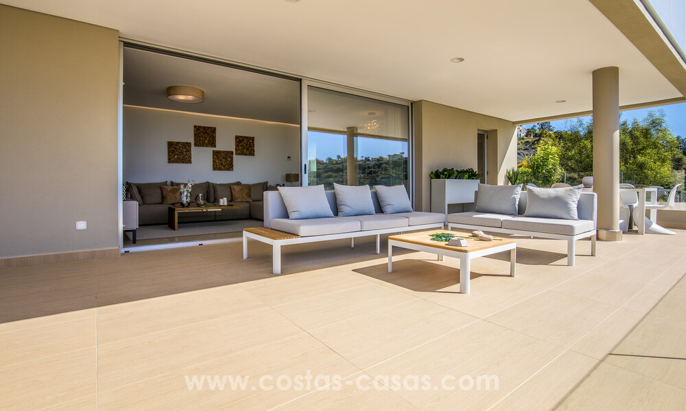 Modernos apartamentos de lujo en venta con vistas al mar en Botanic, una urbanización cerrada en Benahavís - Marbella 805482