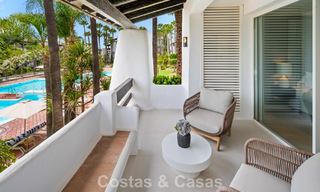 Exclusivo apartamento renovado de 3 dormitorios en venta en Puente Romano, Marbella Golden Mile 805747 