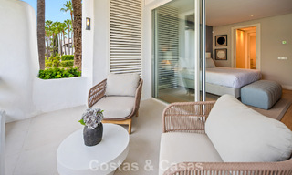 Exclusivo apartamento renovado de 3 dormitorios en venta en Puente Romano, Marbella Golden Mile 805748 