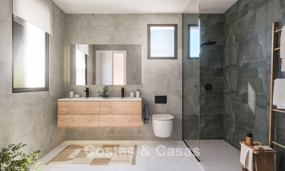 Villas adosadas de obra nueva en un entorno de golf en Estepona 806426