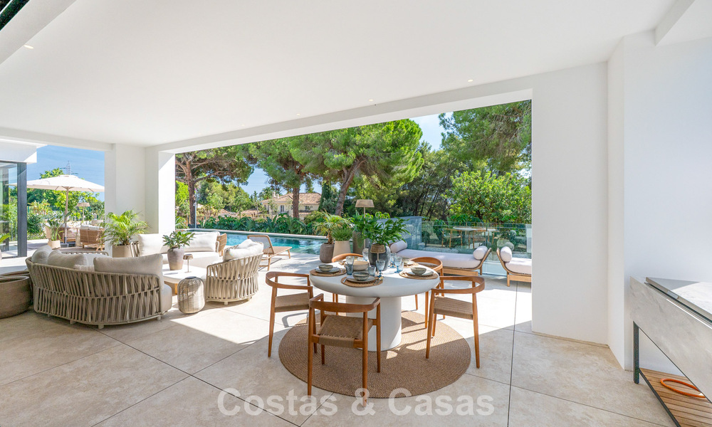 Exclusiva villa moderna de nueva construcción con vistas panorámicas en la prestigiosa Milla de Oro de Marbella 807851