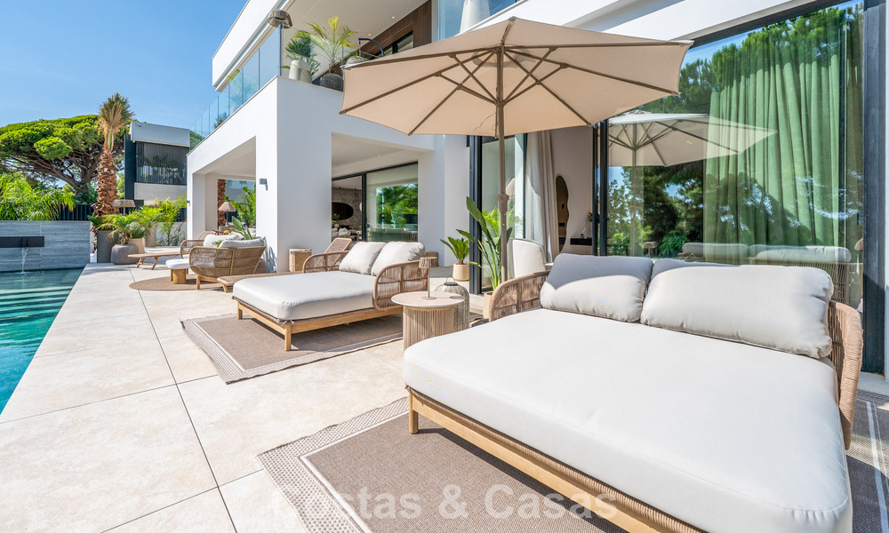 Exclusiva villa moderna de nueva construcción con vistas panorámicas en la prestigiosa Milla de Oro de Marbella 807864