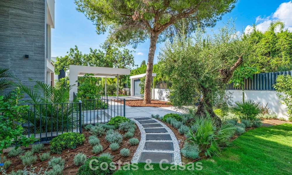 Exclusiva villa moderna de nueva construcción con vistas panorámicas en la prestigiosa Milla de Oro de Marbella 807868