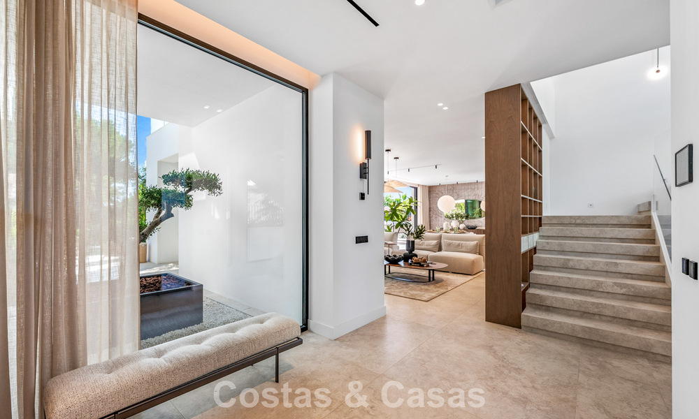 Exclusiva villa moderna de nueva construcción con vistas panorámicas en la prestigiosa Milla de Oro de Marbella 807884